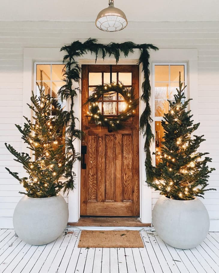 door dressing for christmas Christmas Decor Trend: Doorscaping!  MELANIE LISSACK INTERIORS