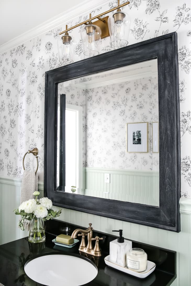 frameless mirror in bathroom