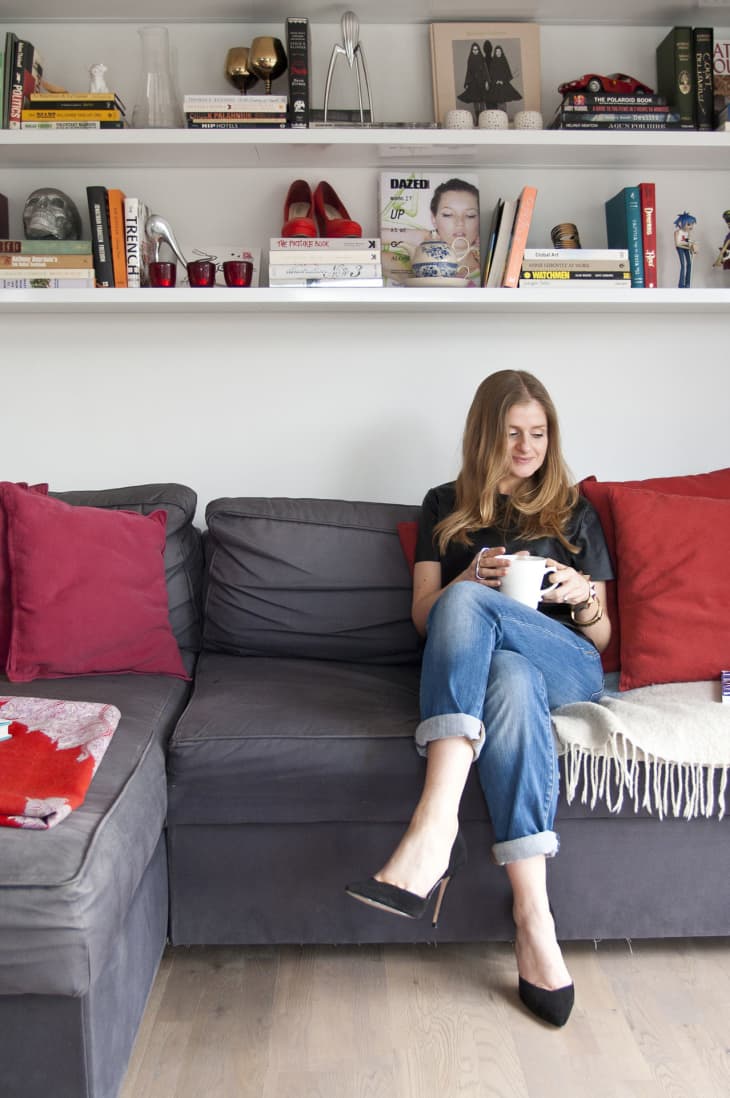 Floating shelves over deals sofa