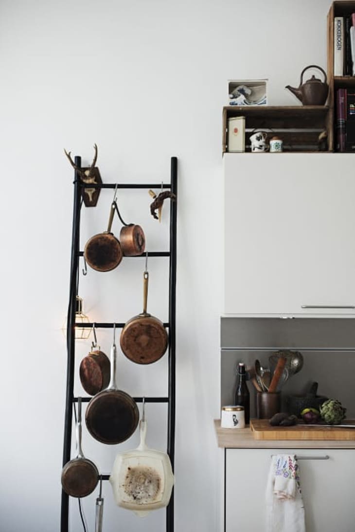 storing pots and pans in small kitchen