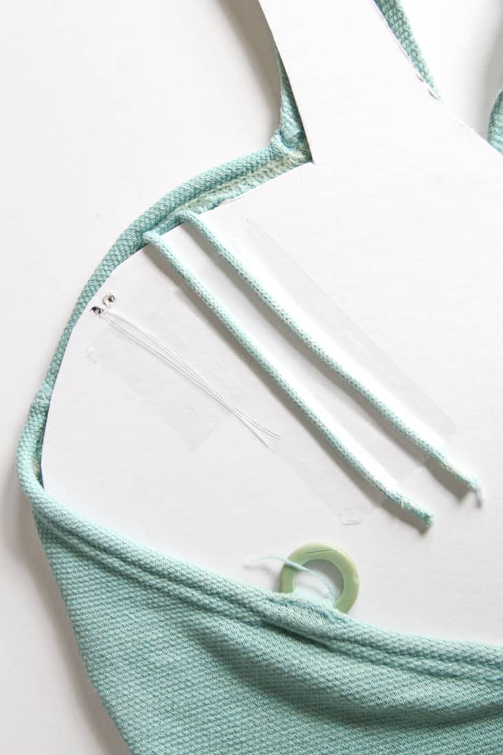 Decorating Idea How To Frame Vintage Clothing to Hang as Art