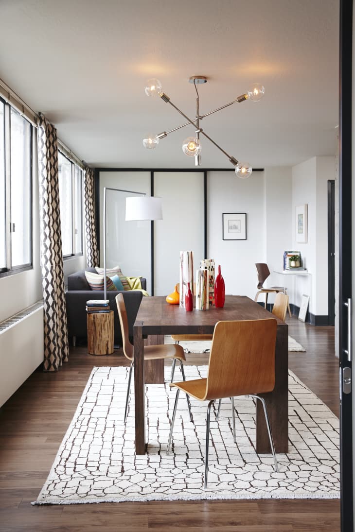 Does a Rug Belong Under a Dining Table? Here's How to Tell. | Apartment