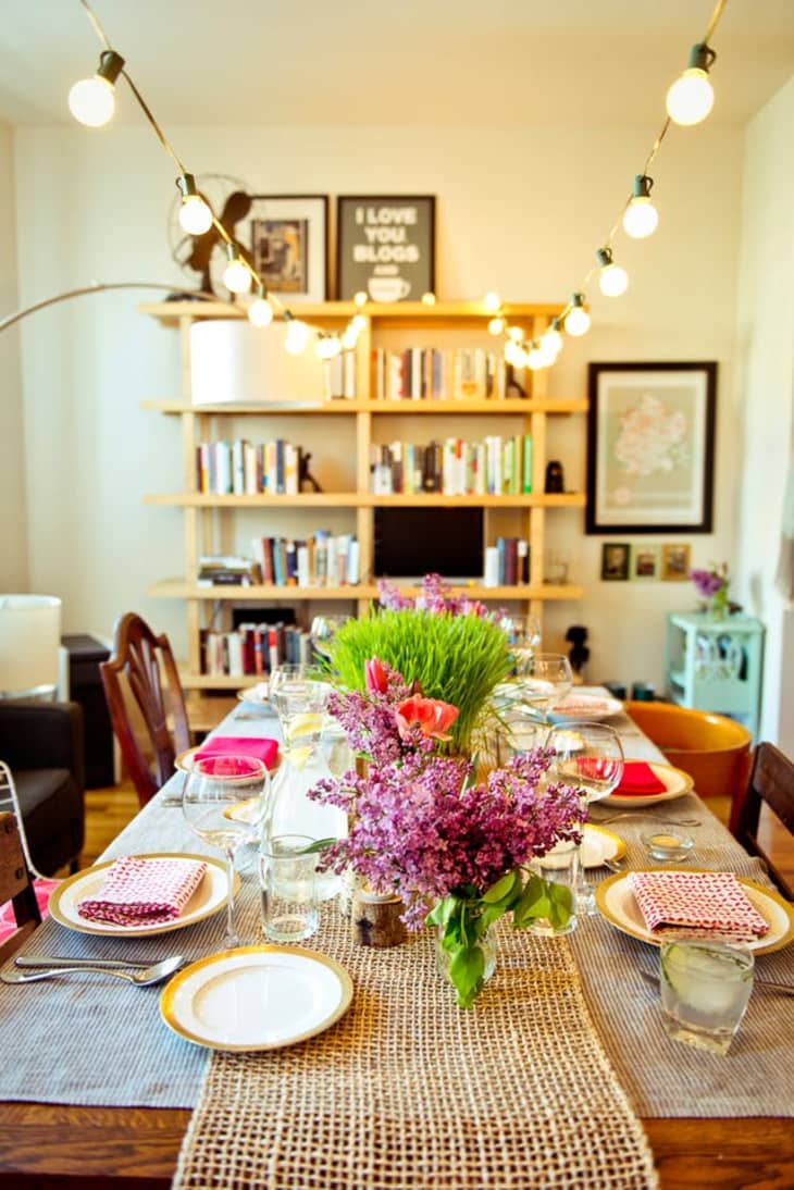 String lights store over dining table