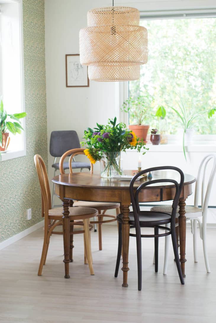 Does a Rug Belong Under a Dining Room Table? Here's How to Tell