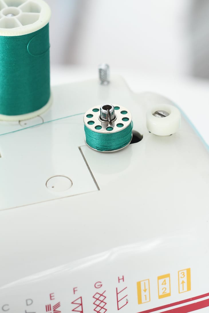 How To Thread a Sewing Machine & Wind a Bobbin | Apartment Therapy