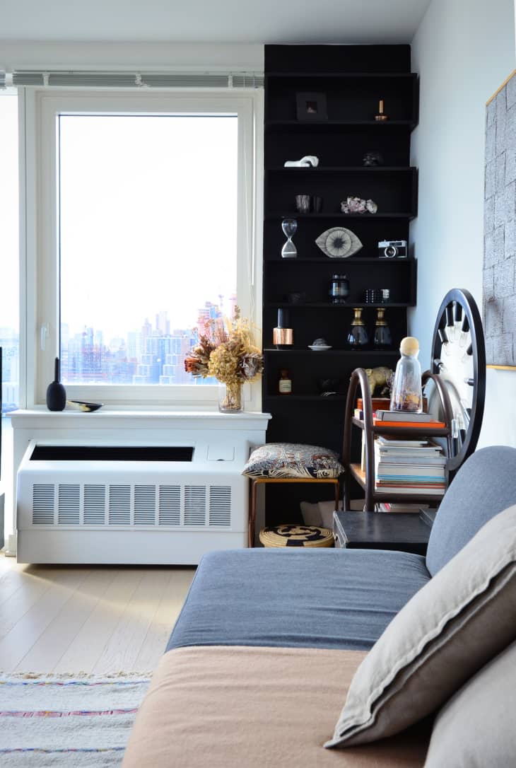 ways-to-make-a-small-space-feel-bigger-paint-one-wall-dark-apartment