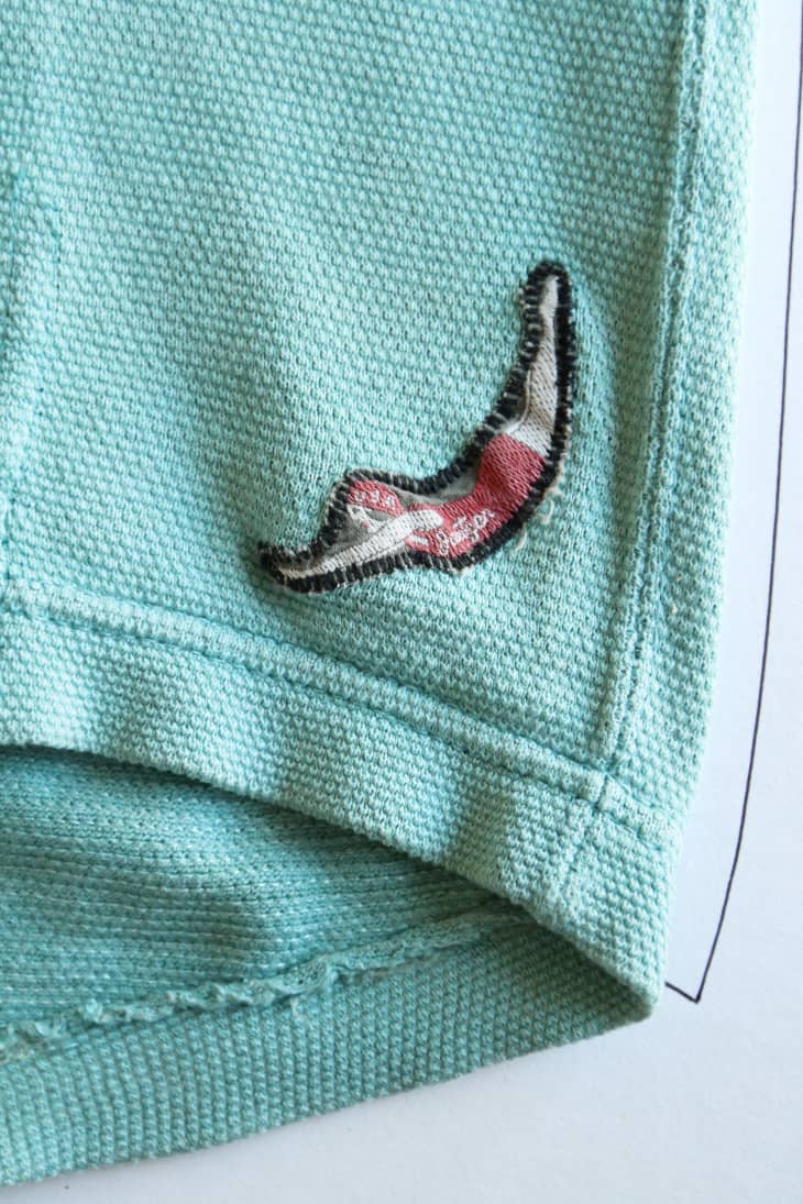 Decorating Idea How To Frame Vintage Clothing to Hang as Art