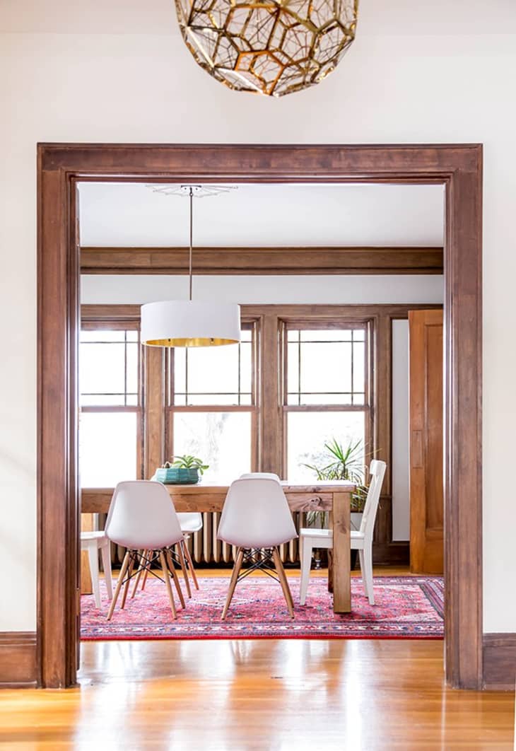 Does a Rug Belong Under a Dining Room Table? Here's How to Tell