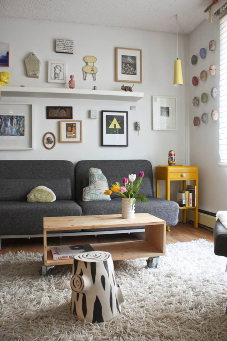 Floating shelves store over couch