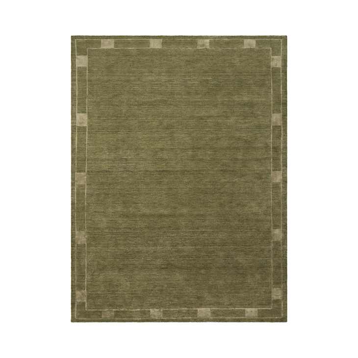 A Border Rug Might Be the Best Solution for a Busy Room | Apartment Therapy