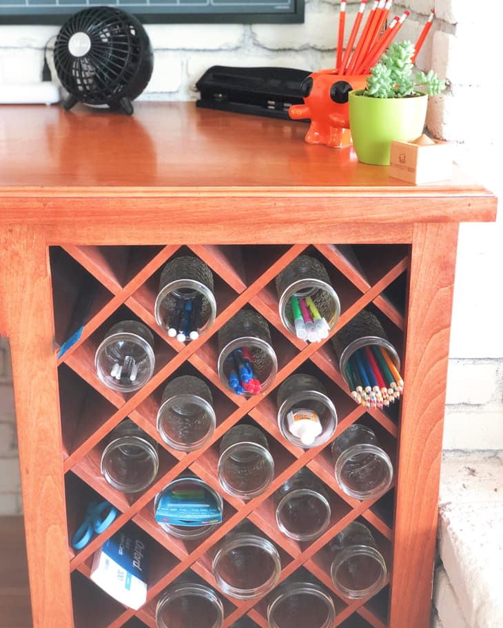 Wine rack between discount cabinets