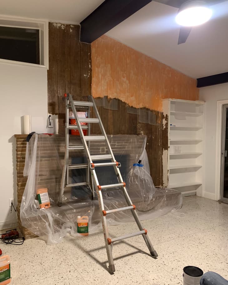 A $700 Fireplace Makeover Restores Mid-Century Wood Paneling