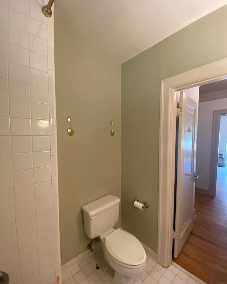 This '90s Bathroom Gets a Bold Makeover with Paint & Paneling ...