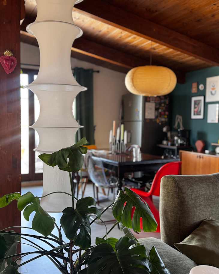 View of A Storage Area Transforms into Cozy Green Living Room | Apartment Therapy
