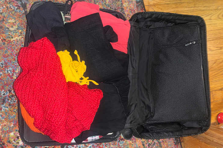 Rolling Clothes for Packing a Suitcase Is So Brilliant | Apartment Therapy