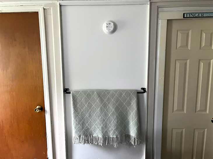 I Put a Curtain Rod on My Living Room Wall, and It’s So Functional ...