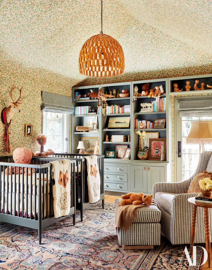 Designer kids room with high ceilings and wallpaper