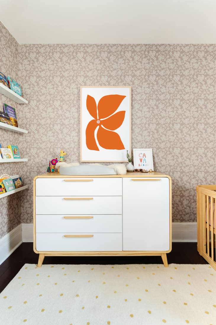 Art print over dresser in newly renovated baby nursery.