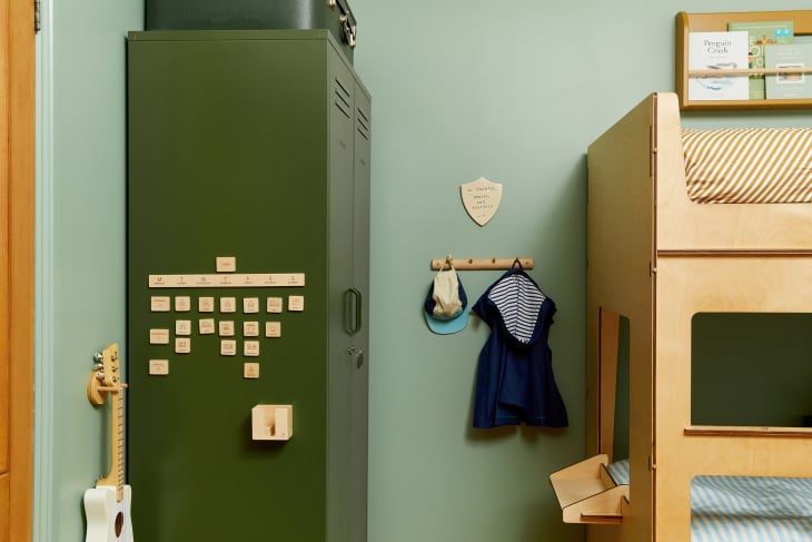 Green kids' room with olive green wardrobe locker