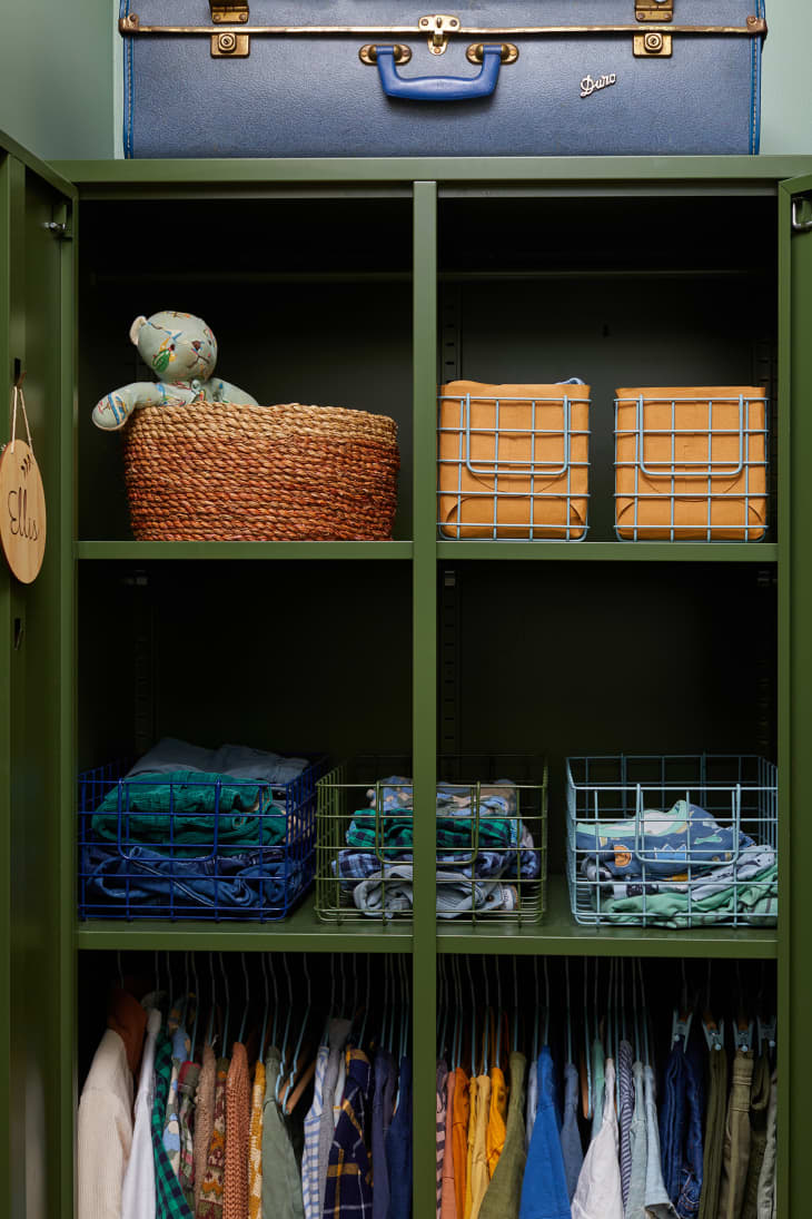 Green kids' room with olive green wardrobe locker