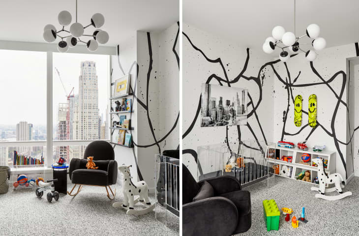 White nursery with black graphic mural and other black accents