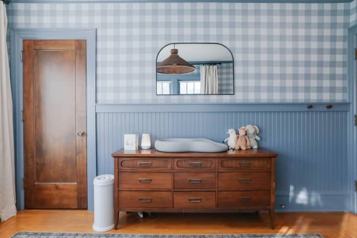Nursery with blue and white plaid/gingham wallpaper
