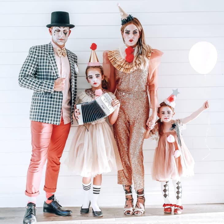 family in circus costume, with fancy details from party dresses