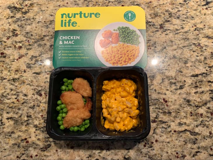 Nurture Life prepared meal opened on kitchen counter.