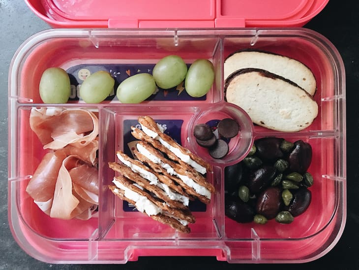 Pink Yumbox with a variety of foods
