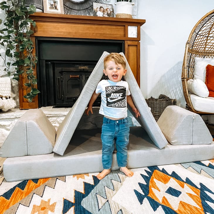 Toddler in front of grey Flip couch