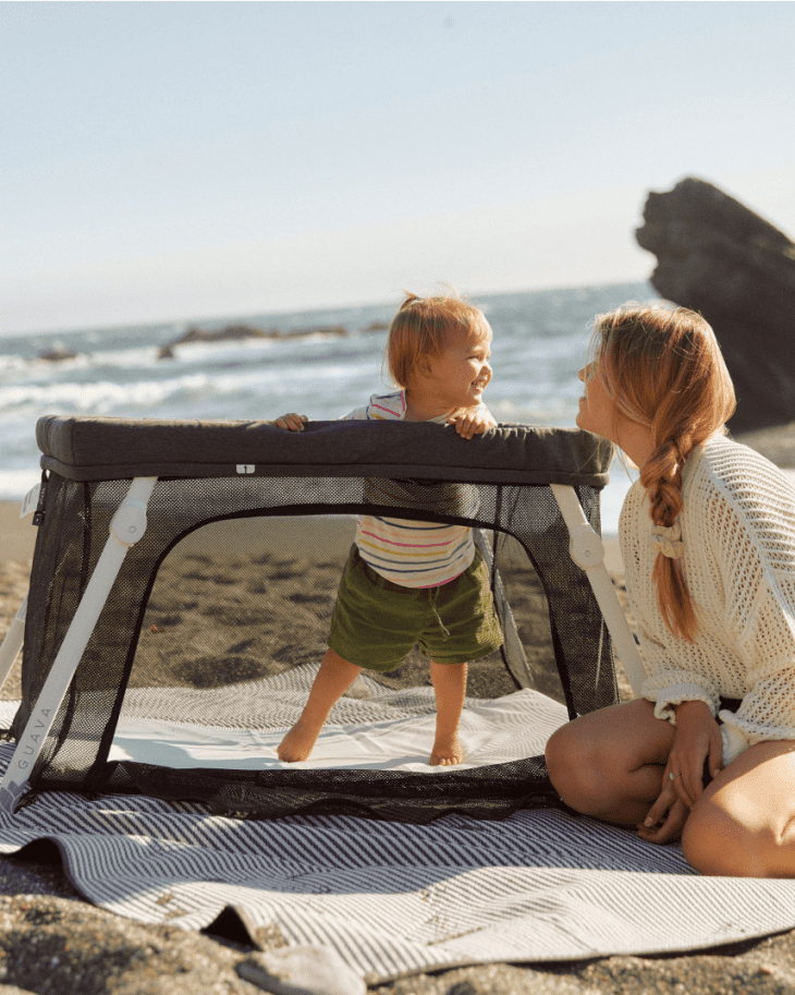 Guava Lotus Travel Crib Review Cubby