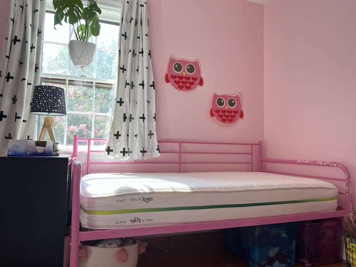 Kids helix mattress on a pink wire frame bed