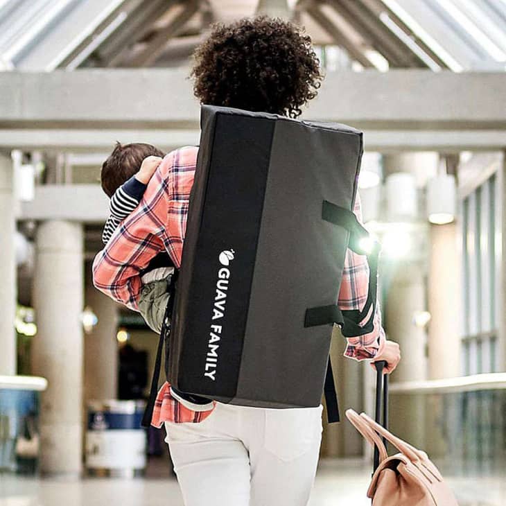 Lotus travel crib backpack best sale