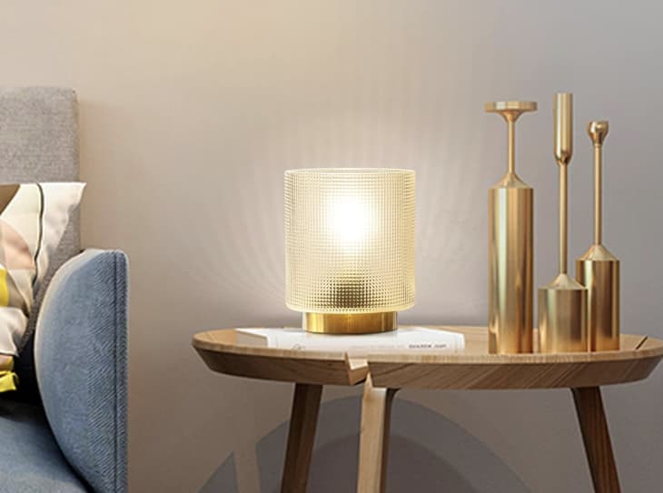 gold glass Battery Operated Lamp on table