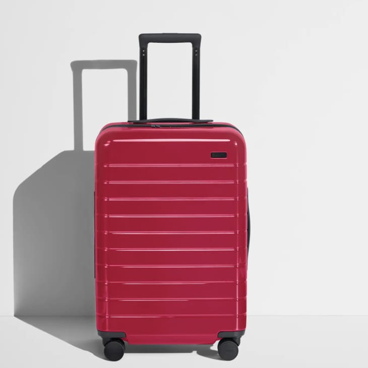 The Bigger Carry-On in Magenta at Away