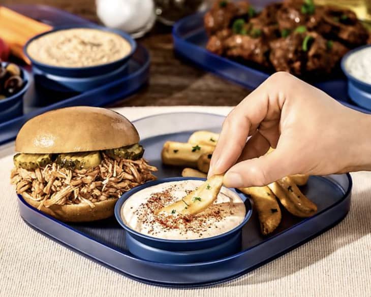 blue dipware tray holding burger, fries, and dipping sauce