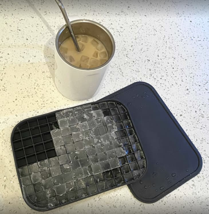 gray pebble ice cube tray next to iced coffee