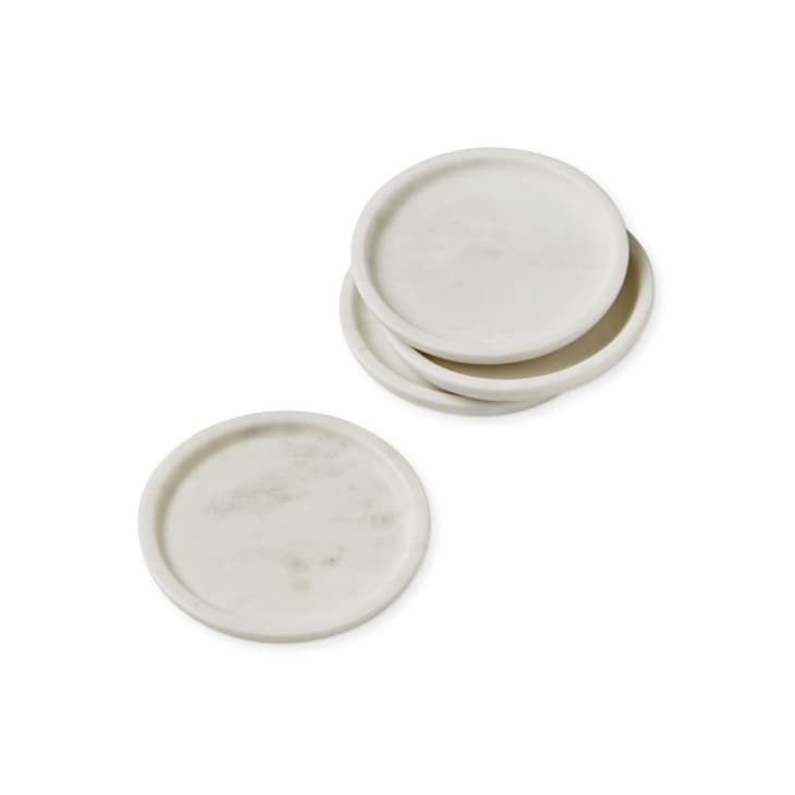 https://cdn.apartmenttherapy.info/image/upload/f_auto,q_auto:eco,w_730/commerce%2Fgift-guides%2F2023-11-30%2Fmarble-coasters-set-of-4