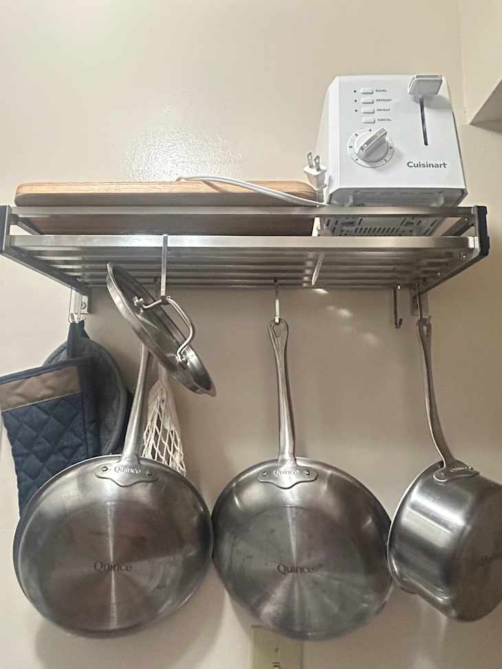 This WallMounted Pan Organizer Transformed My Tiny Kitchen The Kitchn