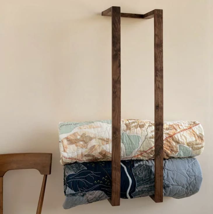 This Uncommon Goods Floating Blanket Shelf Is Great for Small