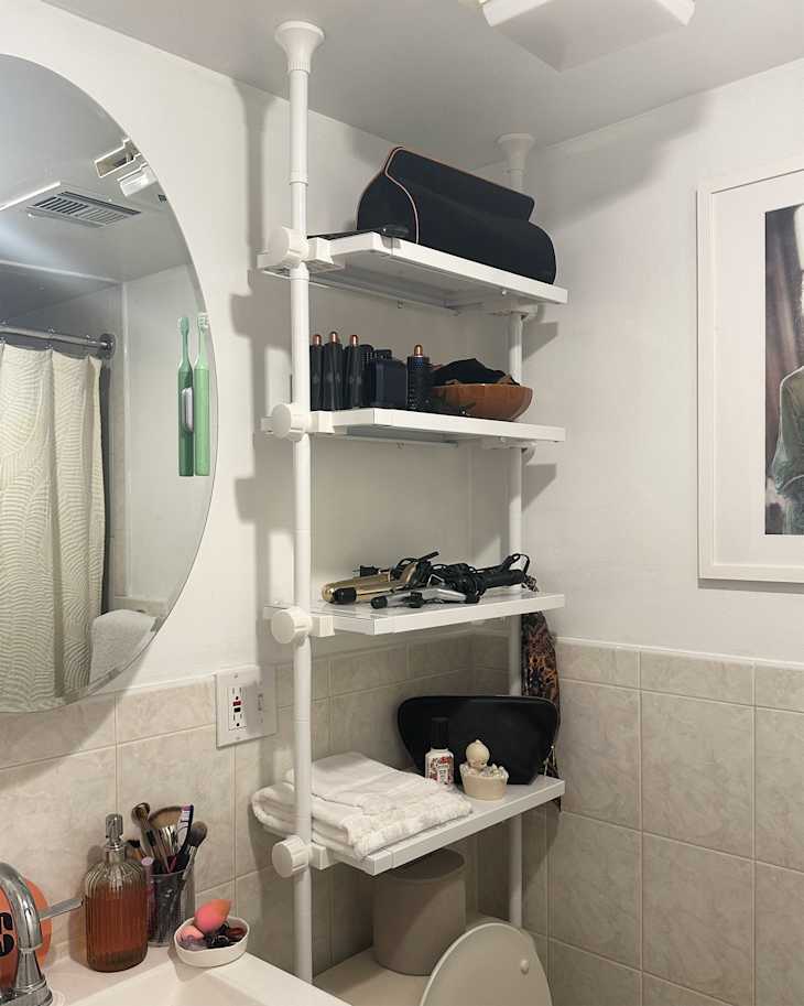 SONGMICS 4-Tier Over-the-Toilet Storage Rack – Space-Saving Bathroom Shelf With Hooks & Roll Holder (Black, Steel)