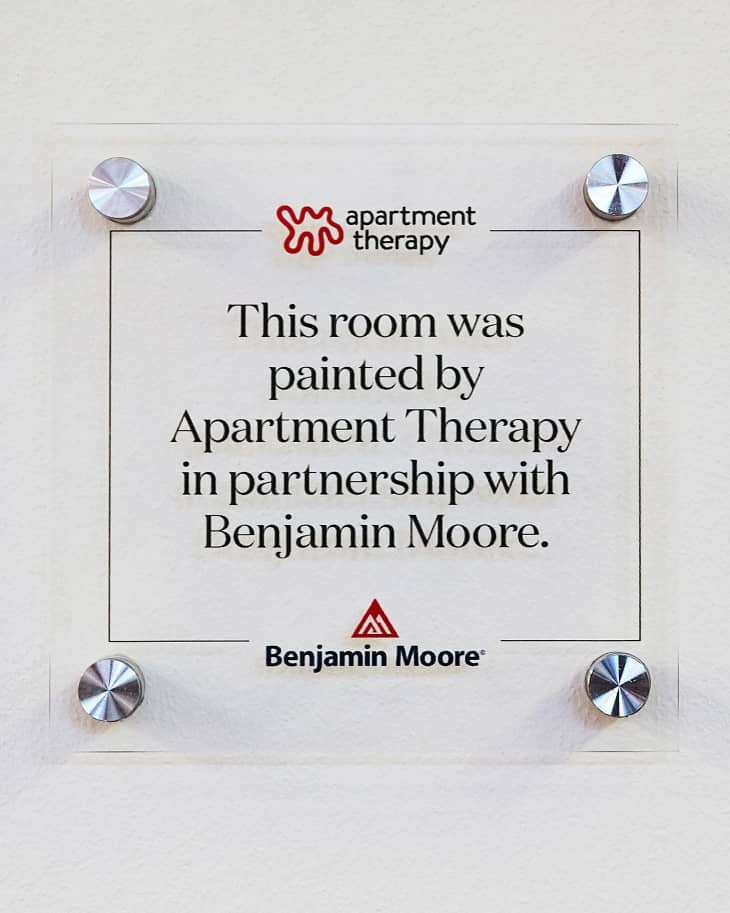 Signage placed in the Henry Houston School library with the phrase "This room was painted by Apartment Therapy in partnership with Benjamin Moore."