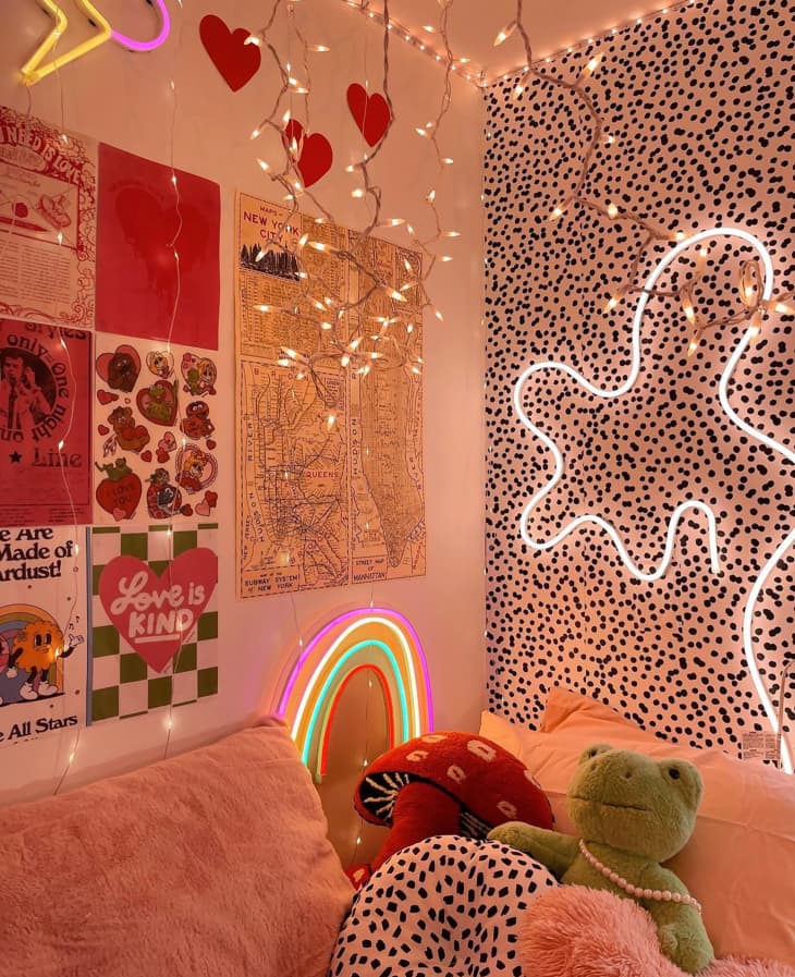 Neon lights mounted on wall in colorful dorm room.