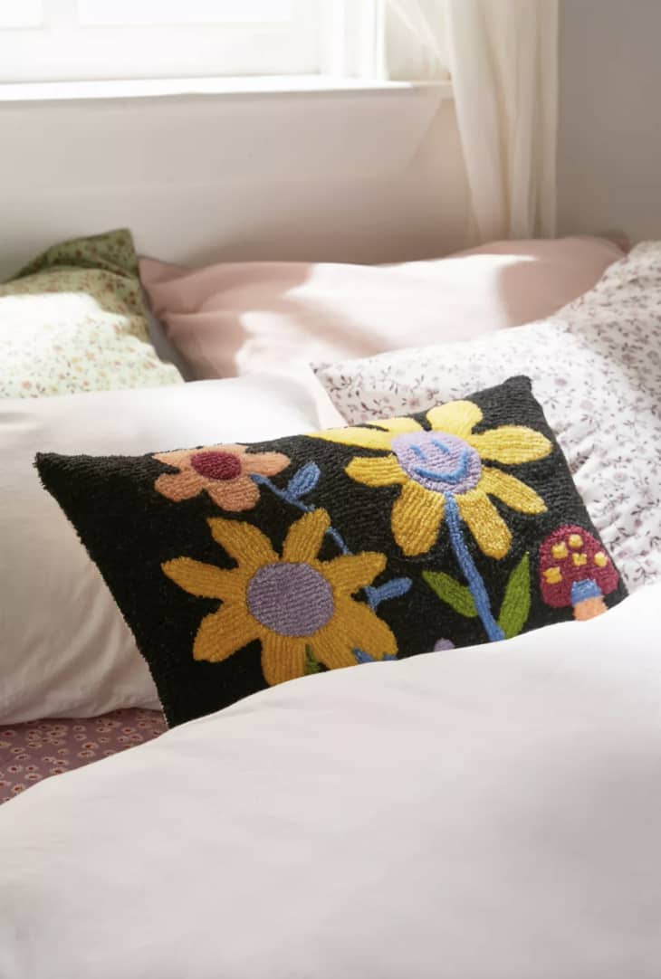 ‘90s Daisy Bolster Pillow at Urban Outfitters