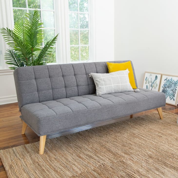 https://cdn.apartmenttherapy.info/image/upload/f_auto,q_auto:eco,w_730/gen-workflow%2Fproduct-database%2FAbbyson-Carson-Mid-Century-Tufted-Convertible-Futon-Sleeper-Sofa