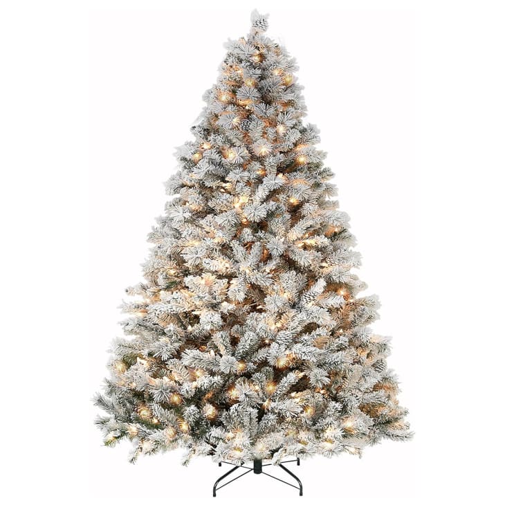 Hykolity Pre-Lit Snow Flocked Artificial Christmas Tree with Pine Cones at Amazon