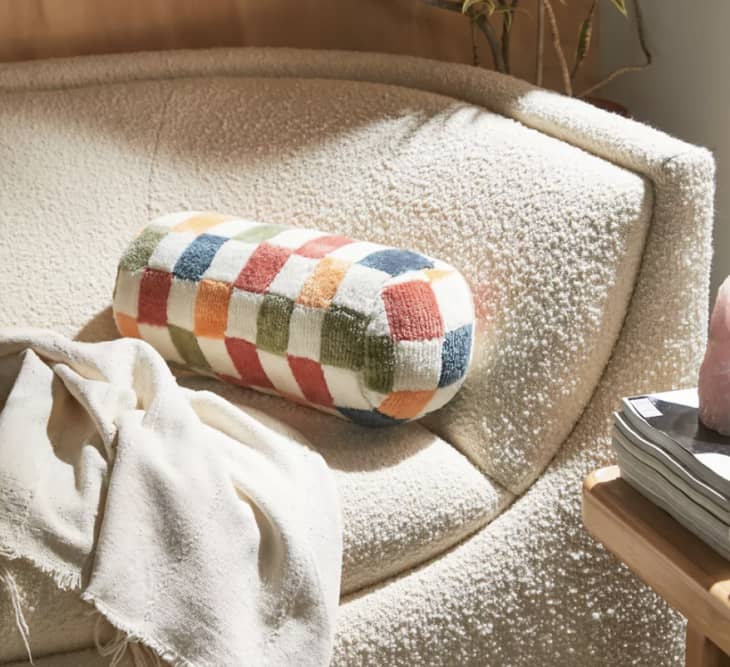 Brody Checkerboard Bolster Pillow at Urban Outfitters
