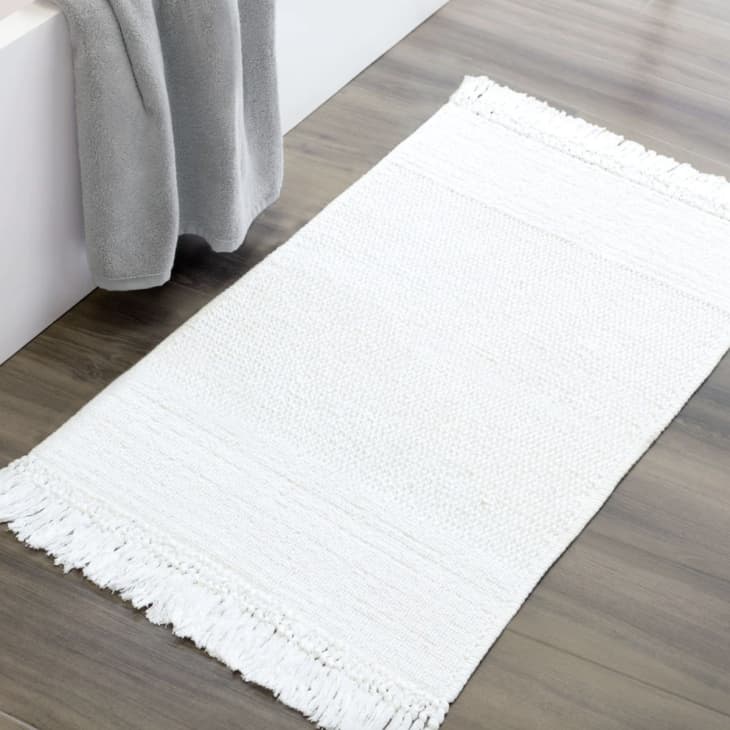 https://cdn.apartmenttherapy.info/image/upload/f_auto,q_auto:eco,w_730/gen-workflow%2Fproduct-database%2FWhite-Fringed-Textured-Bath-Mat-Crane-Canopy