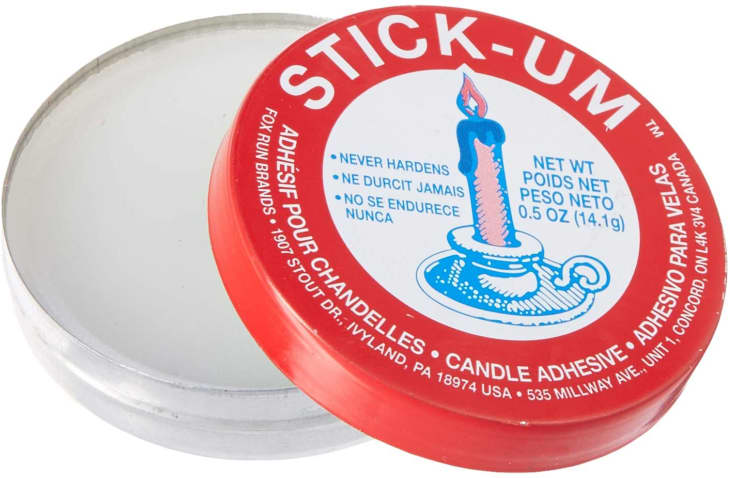 Fox Run Stick-Um Candle Adhesive, 0.5-Ounce at Amazon