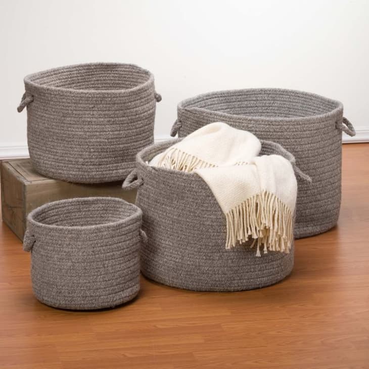 https://cdn.apartmenttherapy.info/image/upload/f_auto,q_auto:eco,w_730/gen-workflow%2Fproduct-database%2Fnatural-wool-baskets-dark-gray-west-elm